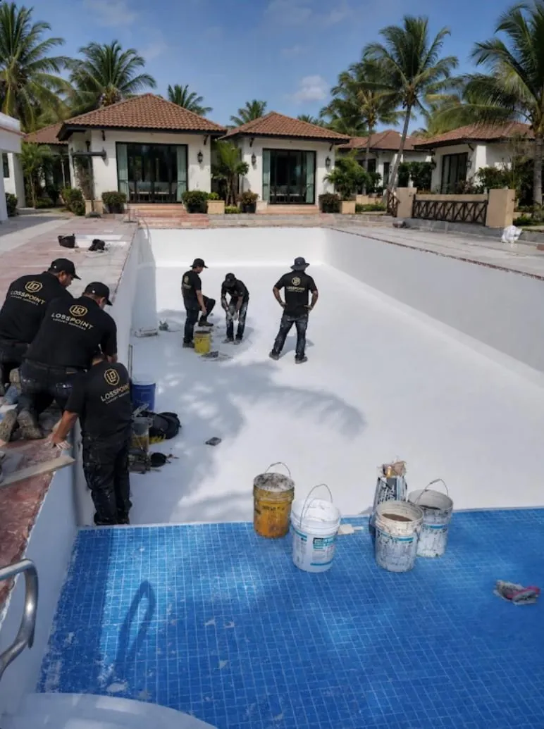 LossPoint field team examining a hotel swimming pool during a water-loss investigation